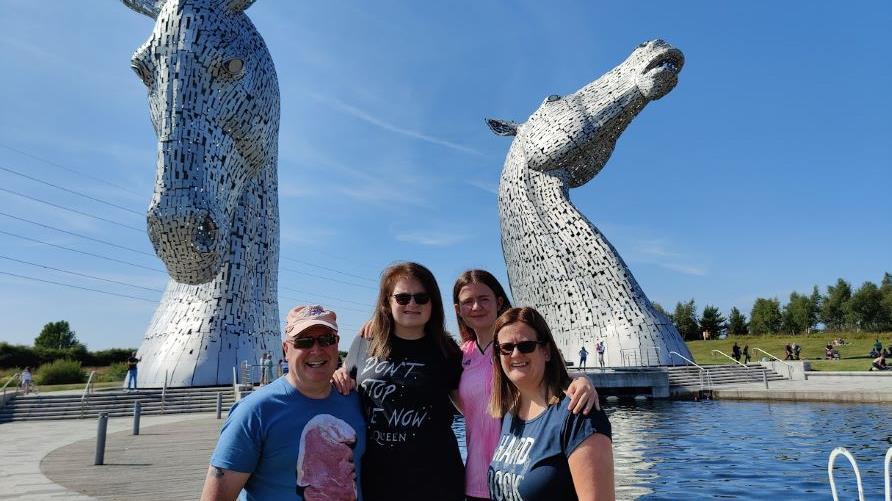 Hilton Grand Vacations Members posing, Kelpies, Scotland. 