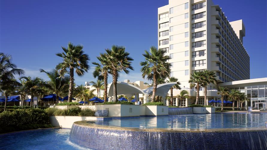 Palm trees and fountain outside the Caribe Hilton in San Juan, Puerto Rico. 