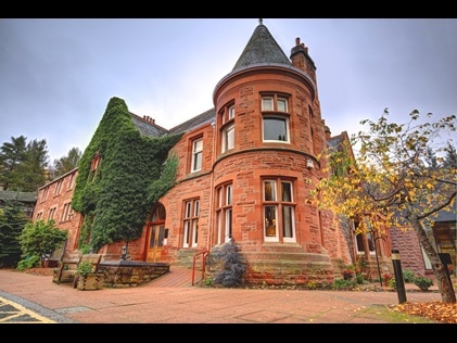 Exterior shot of Hilton Grand Vacations at Craigendarroch Suites in Scotland. 