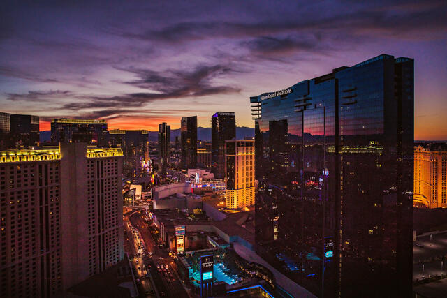 Aerial shot of Elara, a Hilton Grand Vacations Club and The Strip at sunset in Las Vegas. 