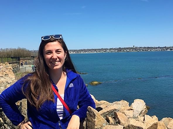 Hilton Grand Vacations Owner posing with a gorgeous vista in the distance. 