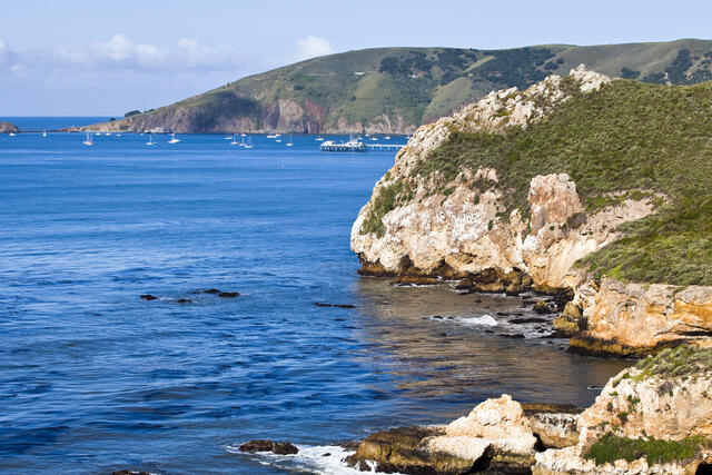 Stunning image of Avila Beach cliffs and bright blue Pacific ocean waters, California. 