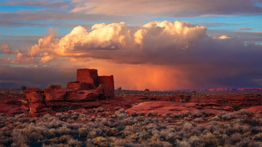 Scenic desert landscape with the Lomaki Pueblo Ruins at sunset in Wupatki National Monument near Sedona, Arizona
