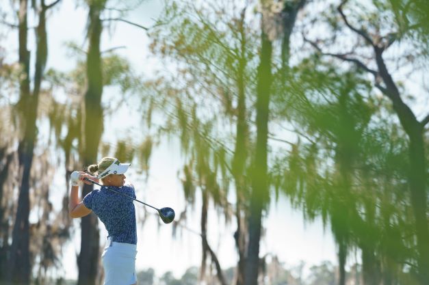 LPGA athlete mid-swing, the 2022 Hilton Grand Vacations Tournament of Champions, Orlando, Florida.