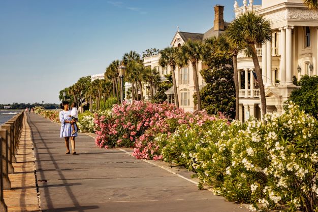 Woman and young child walking along The Battery, Charleston, South Carolina. 