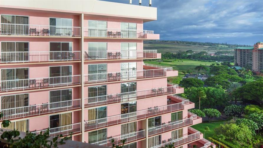 Dusty pink exterior of Hilton Vacation Club Ka'anapali Beach in Maui, Hawaii