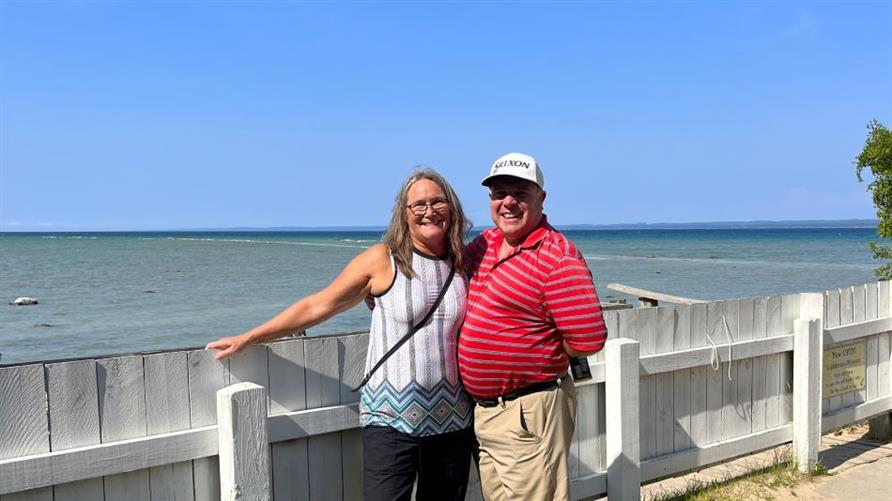 Two Hilton Grand Vacations Member on the shore of Lake Michigan