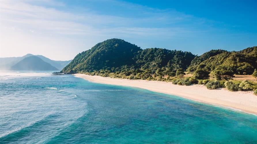 View of Bali's blue water and white beaches in Indonesia