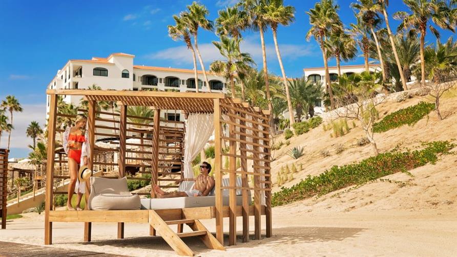 A couple in a cabana at La Pacifica Los Cabos, a Hilton Club in Mexico