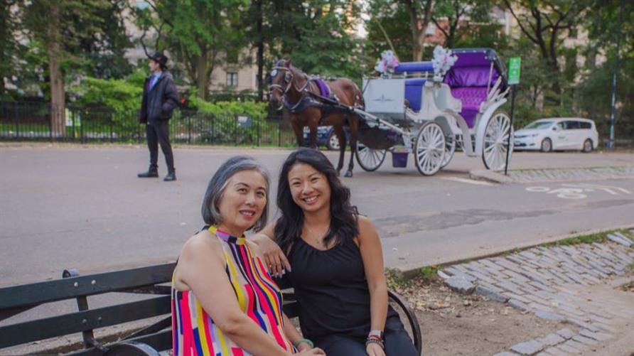 A Hilton Grand Vacations Member and her family member in New York