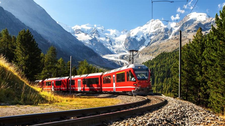 A red train in the Swiss Alps