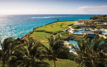 Stunning aerial view of The Crane, a Hilton Grand Vacations Club perched atop a coastal cliff, Barbados.