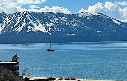 View of lake and snow-dusted mountains from a studio at Hilton Vacation Club Lake Tahoe Resort
