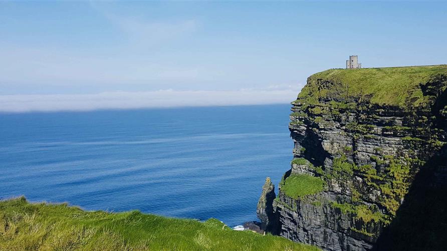 Scenic view of a cliff overlooking the ocean.