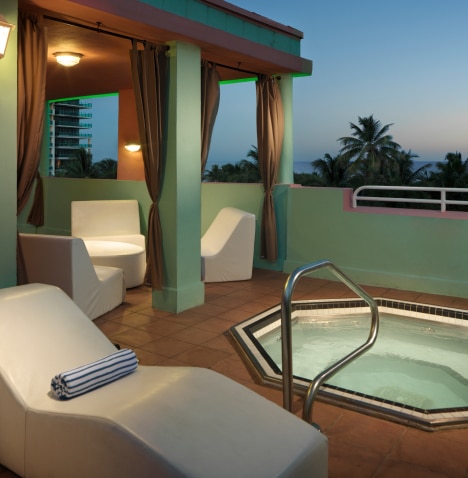 The rooftop hot tub and a recliner at The Crescent on South Beach, a Hilton Vacation Club in Miami, Florida
