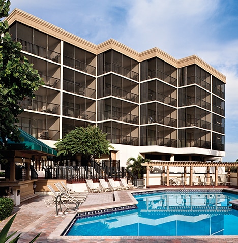 Pool  and exterior of Plantation Beach Club at Indian River Plantation
