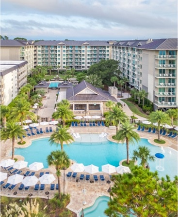 View from balcony of pool and ocean at Ocean Oak Resort, a Hilton Grand Vacations Club