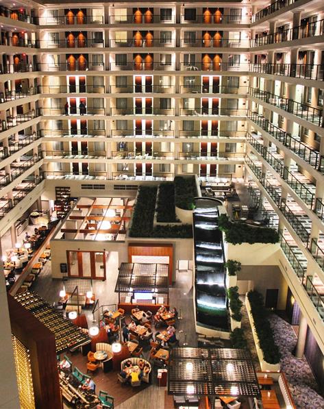 The District, a Hilton Club lit up at night
