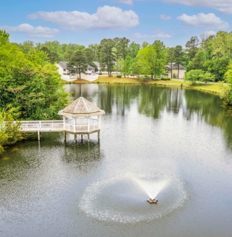 Aerial view of gazebo and fountain at a lake at The Historic Powhatan